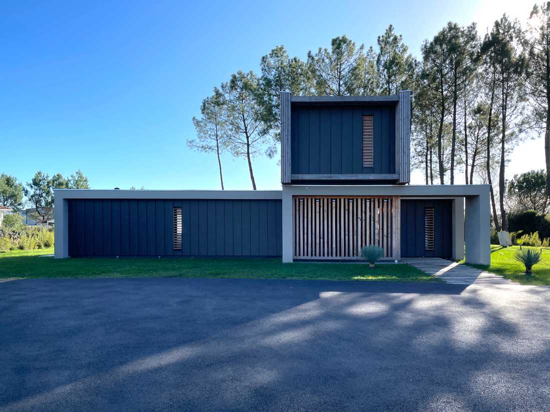 Maison comteporaine en bois dans le Village Aéronautique des Lacs à Biscarosse